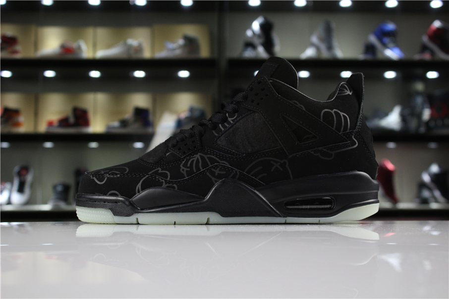 Mens KAWS x Air Jordan 4 Cool Black glow-in-the-dark outsole